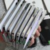 Hình ảnh một loạt iPhone cũ được bán tại cửa hàng ở Đà Nẵng, chất lượng tốt và giá rẻ.